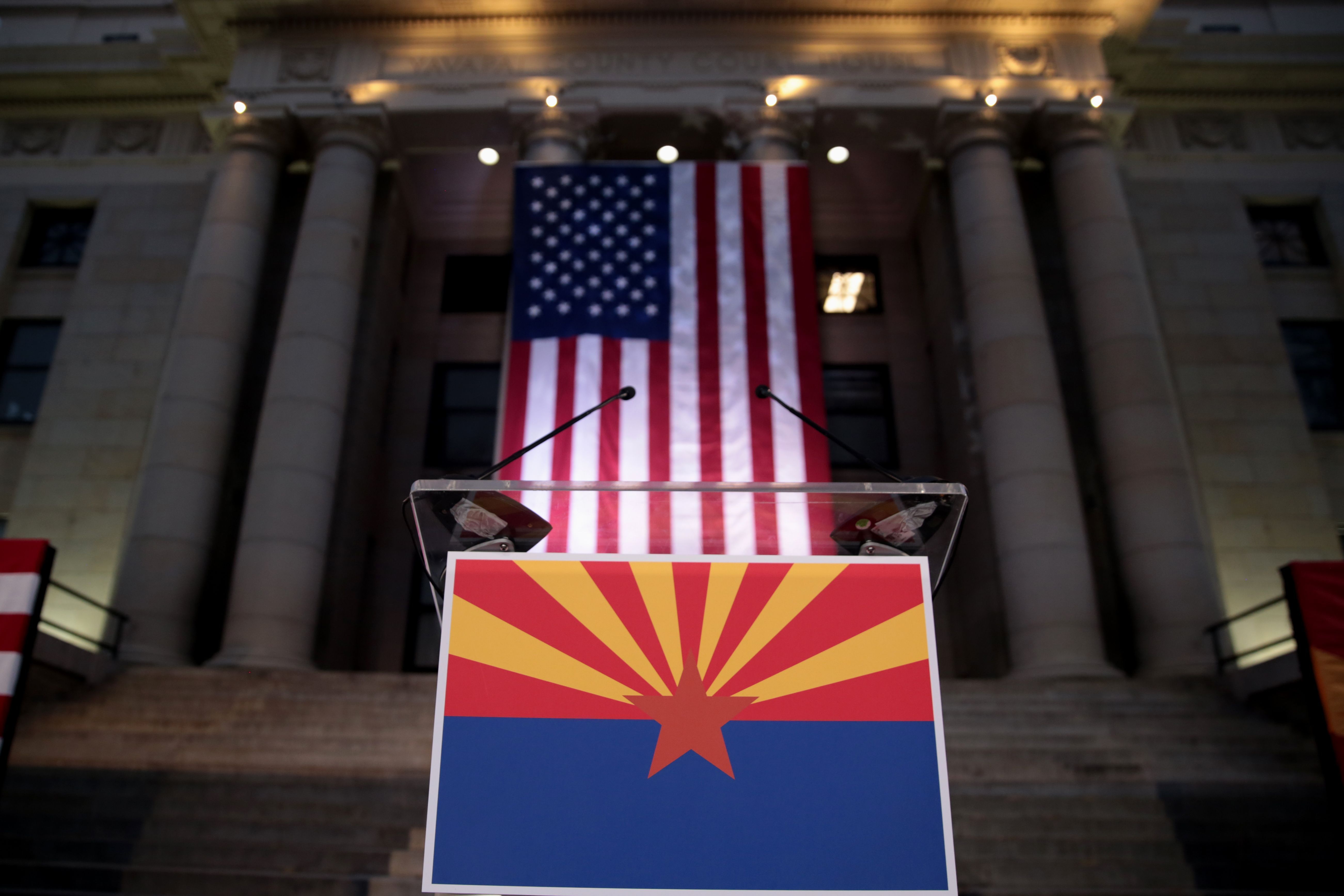 Yavapai County Courthouse with the Arizona flag at night in downtown Prescott, Arizona